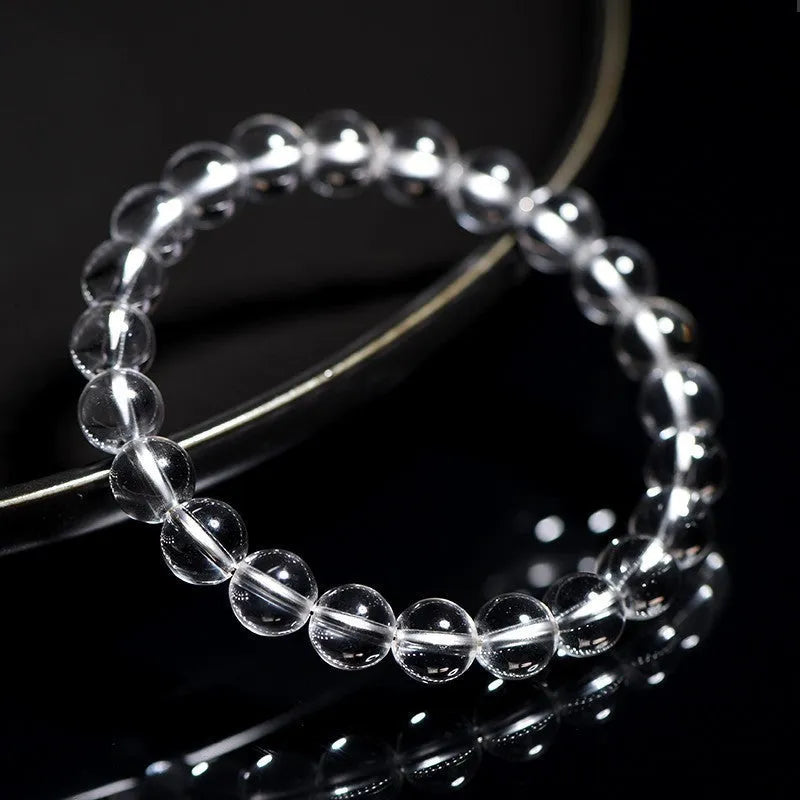 Natural Donghai Old Materials white crystal bracelet with round beads on a single strand, showing geometric design