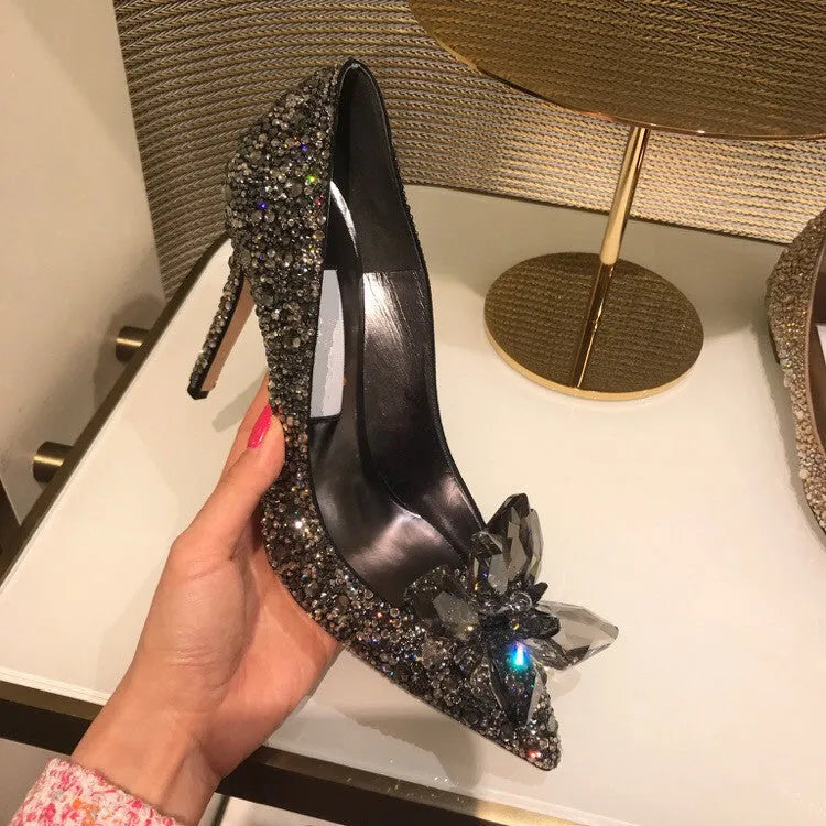 Women's gold pointed toe high heels with rhinestones and sequins on a 7cm stiletto heel