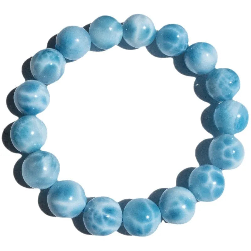 Blue Bodhi bead bracelet with manual processing and pearl accents in Maillard style, showing bead sizing options