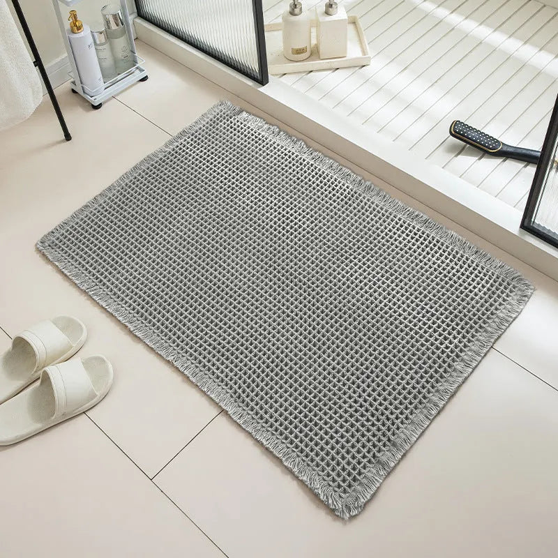 Square checkered pattern bathroom carpet with non-slip backing in beige colour, 61x92cm size