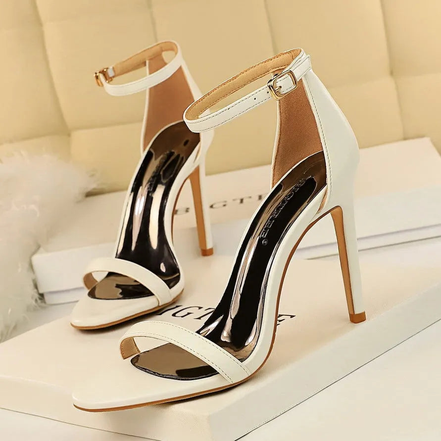 Women's open toe ankle-strap high heels with adjustable buckle, available in six colours and seven sizes