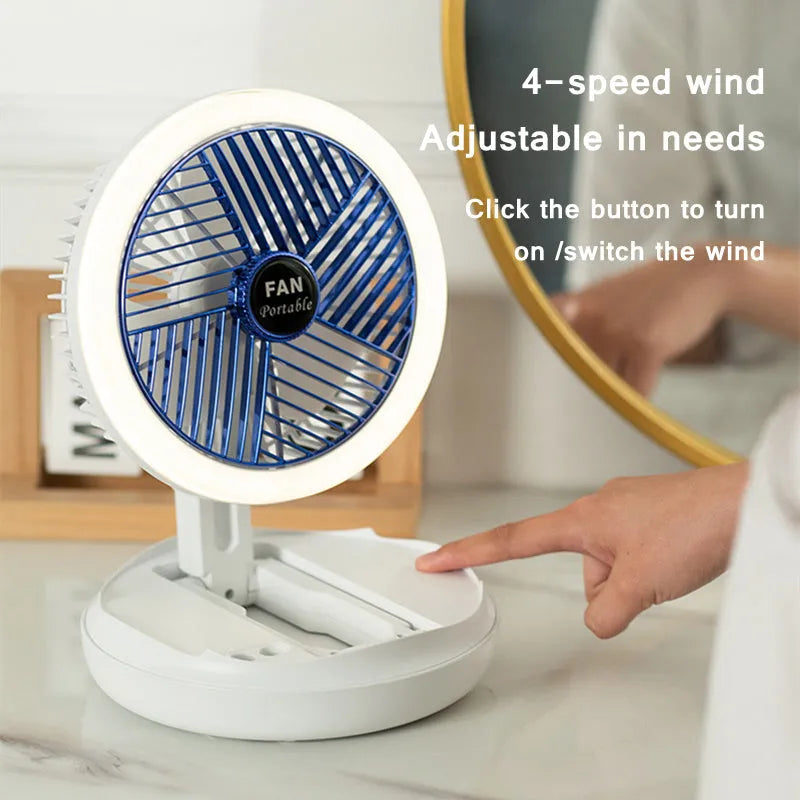 Blue foldable table fan with LED light showing 300° rotation angle and Type-C charging port