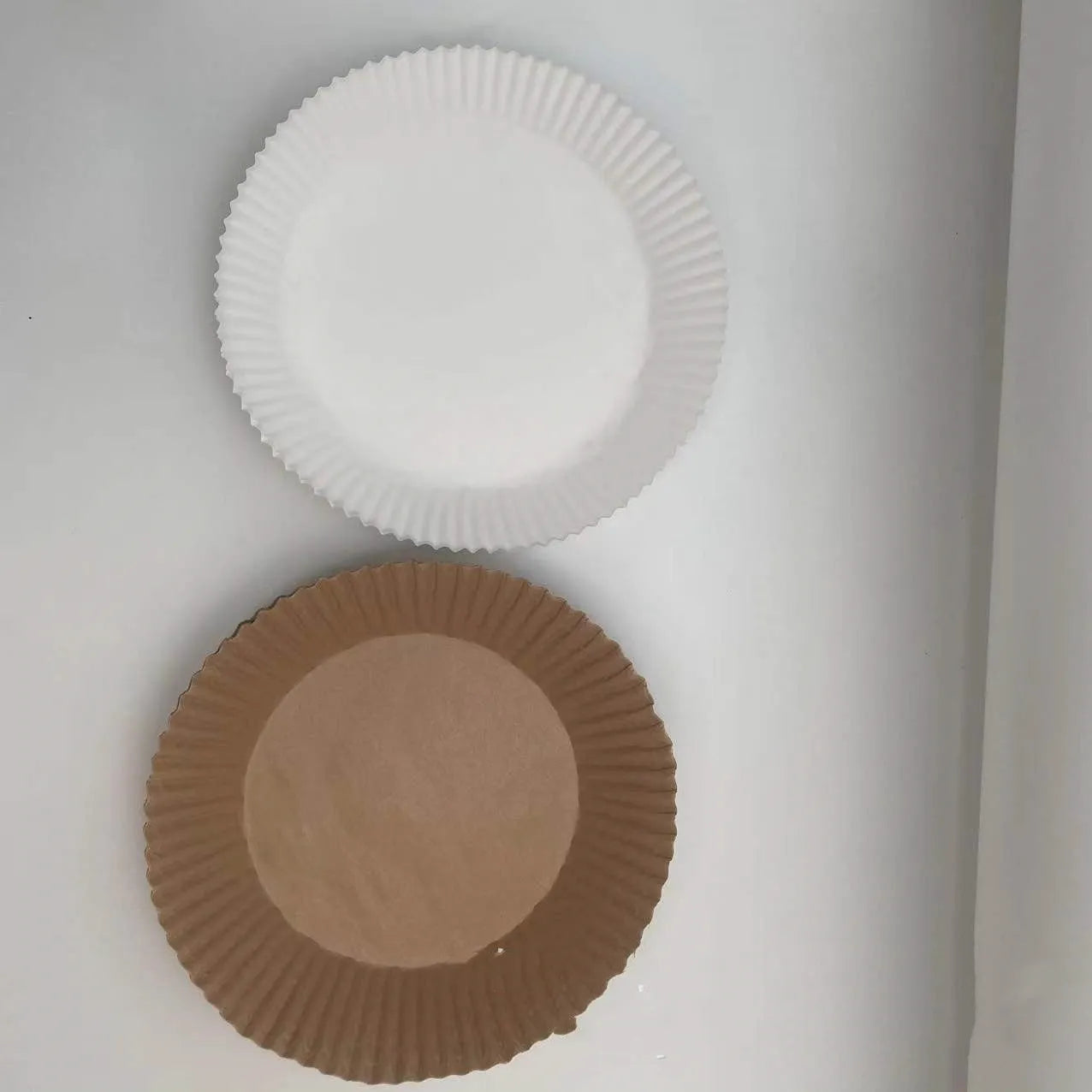 Disposable air fryer paper liners in round bowl shape with 4.5cm edges