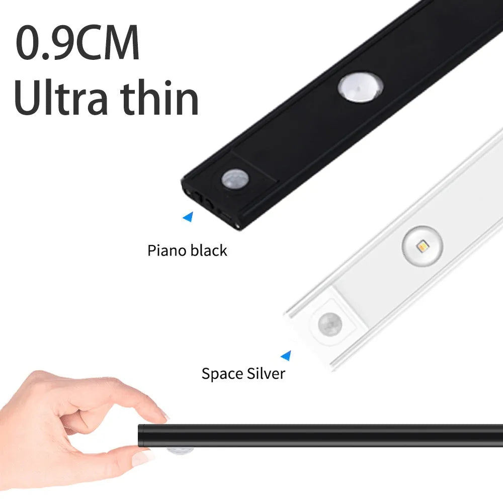 Ultra-thin USB LED night light with motion sensor in silver or black, showing magnet attachment for cabinets