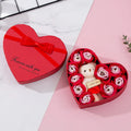 Heart-shaped red gift box containing scented soap roses for bath use
