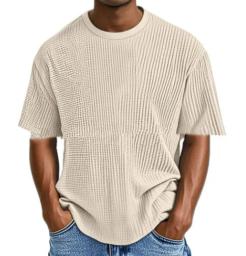Men's light blue waffle knit short sleeve cotton blend t-shirt laid flat, showing texture and regular fit.