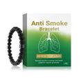 Men's Smoke Prevention Bracelet with glass and black gallstone materials on a wrist