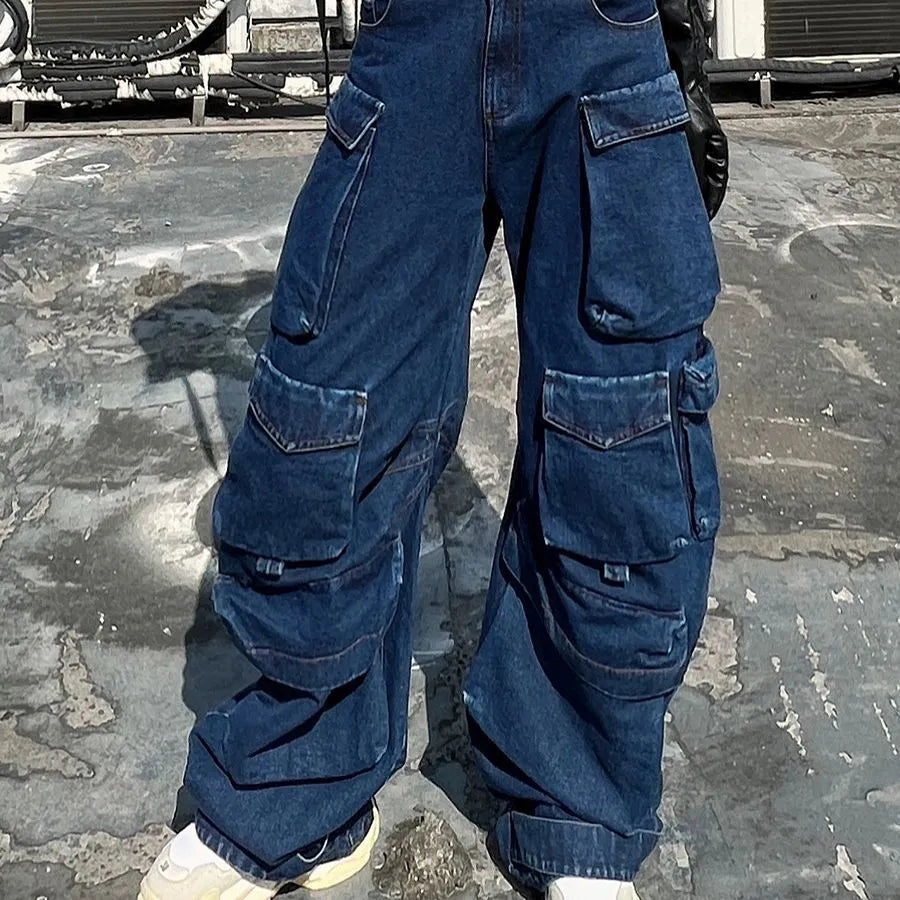 Dark blue distressed wide-leg women's jeans with a high waist and multiple pockets on a mannequin.