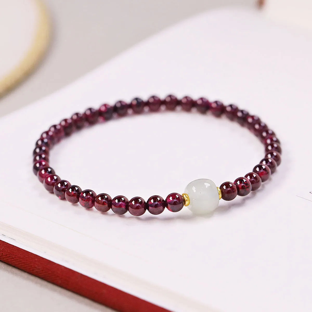 Natural garnet women's bracelet with U-shaped design in 4mm or 6mm polished beads