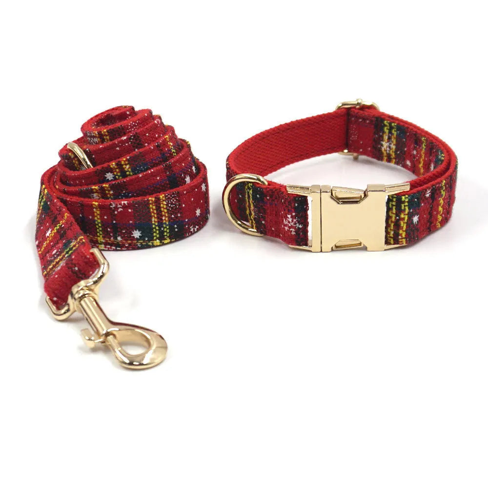 Red Christmas pet collar set with matching traction rope, bow, chest back, and stool bag accessories