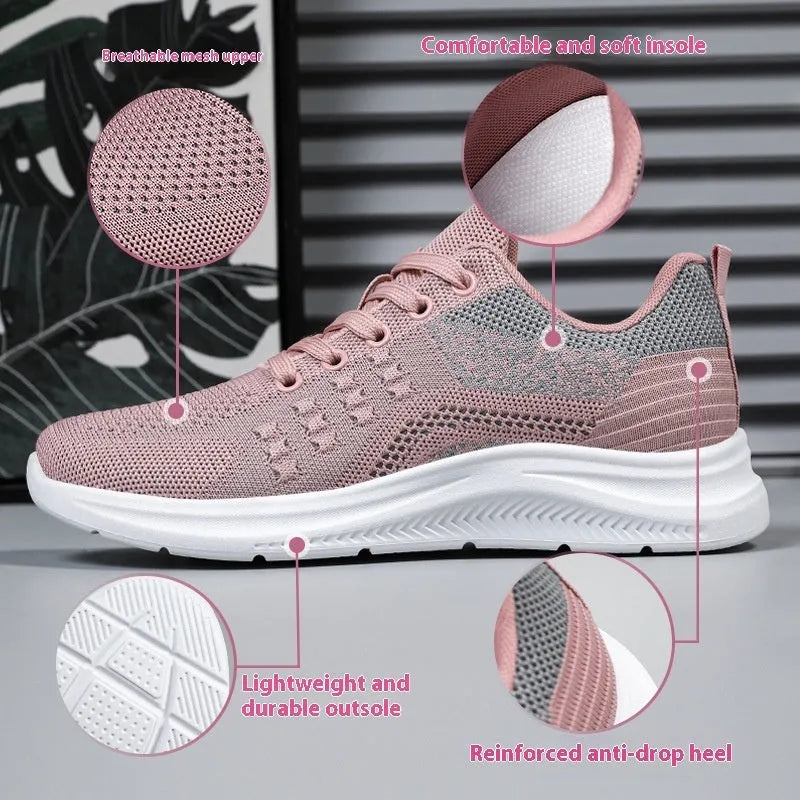 Women's black lightweight mesh sneakers with lace-up front and soft PVC sole on a white background.