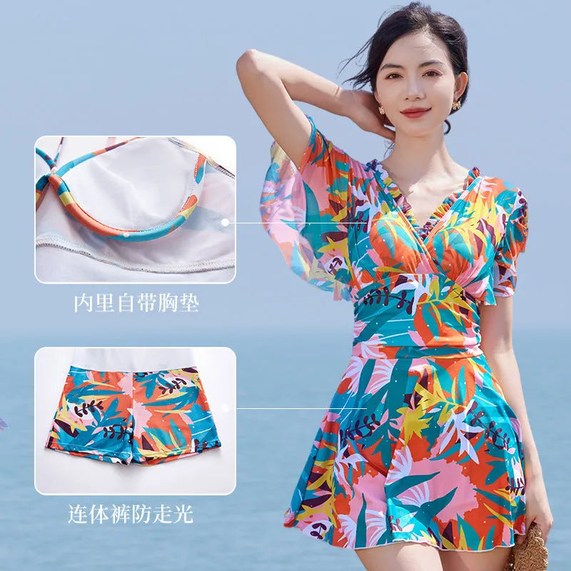 Women's cover belly one-piece swimsuit with colourful printed pattern in polyester fabric