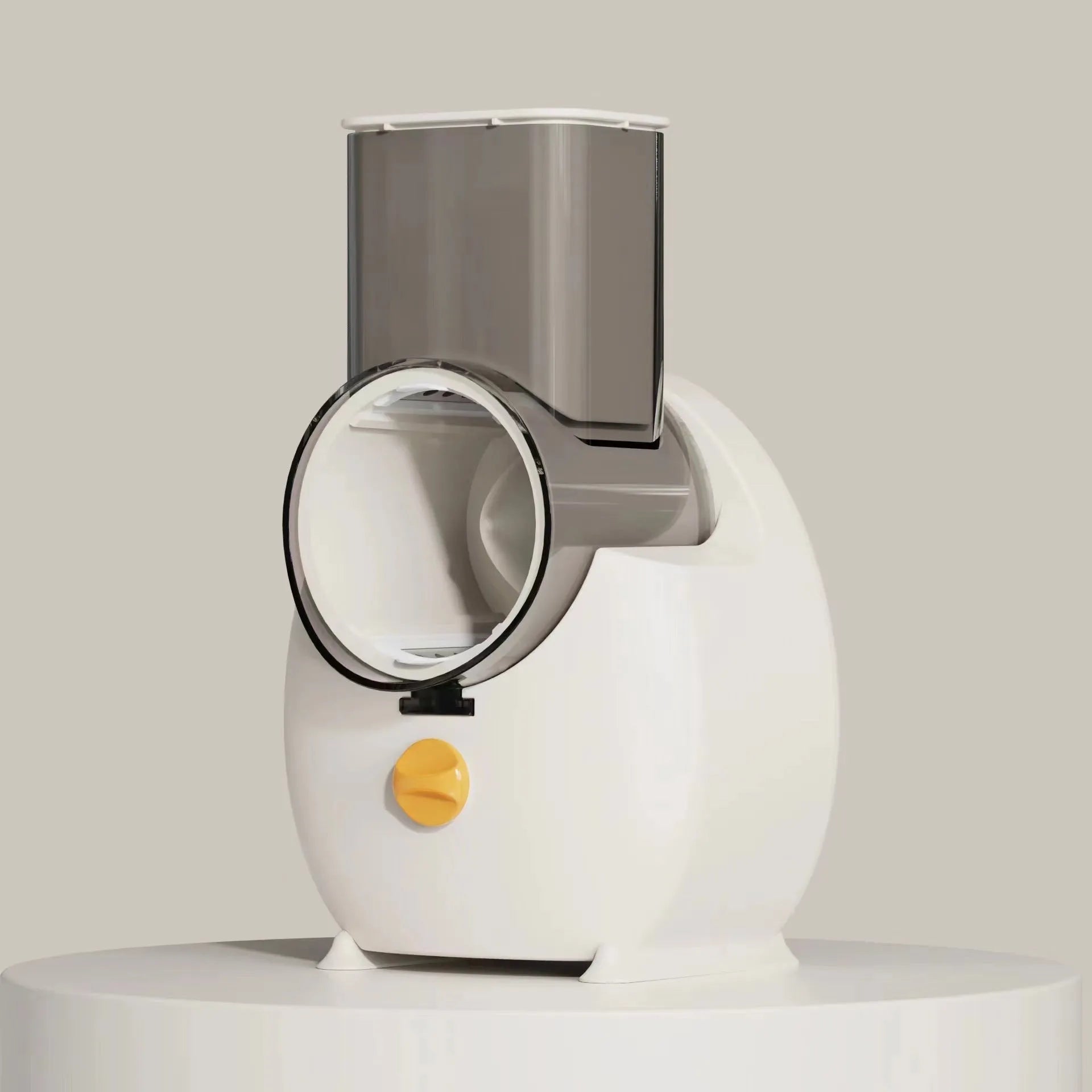 White electric vegetable slicer with interchangeable blades and suction base on a kitchen counter