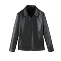 Men's black PU leather jacket with windproof design, loose fit, and zipper pockets, shown in a casual setting.