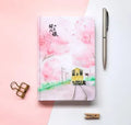 Muco hardcover A4 notebook with pink Sakura Flower Orbit AR design on paper cover.