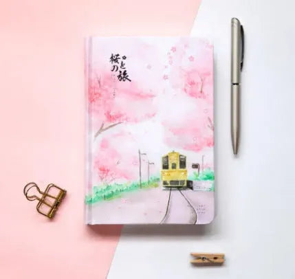 Muco hardcover A4 notebook with pink Sakura Flower Orbit AR design on paper cover.