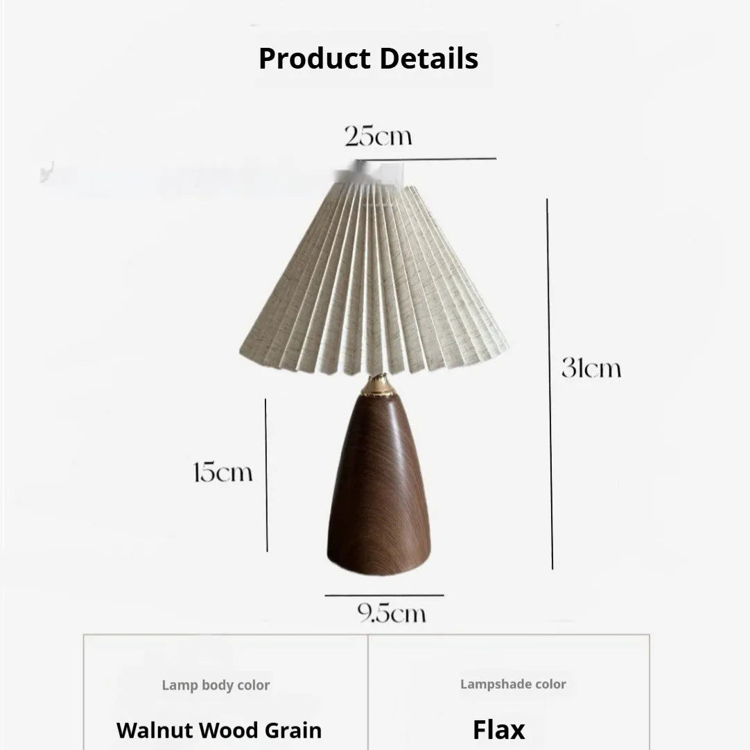 Nordic retro ceramic bedside table lamp with a pleated tapered floral fabric shade on a ceramic base.