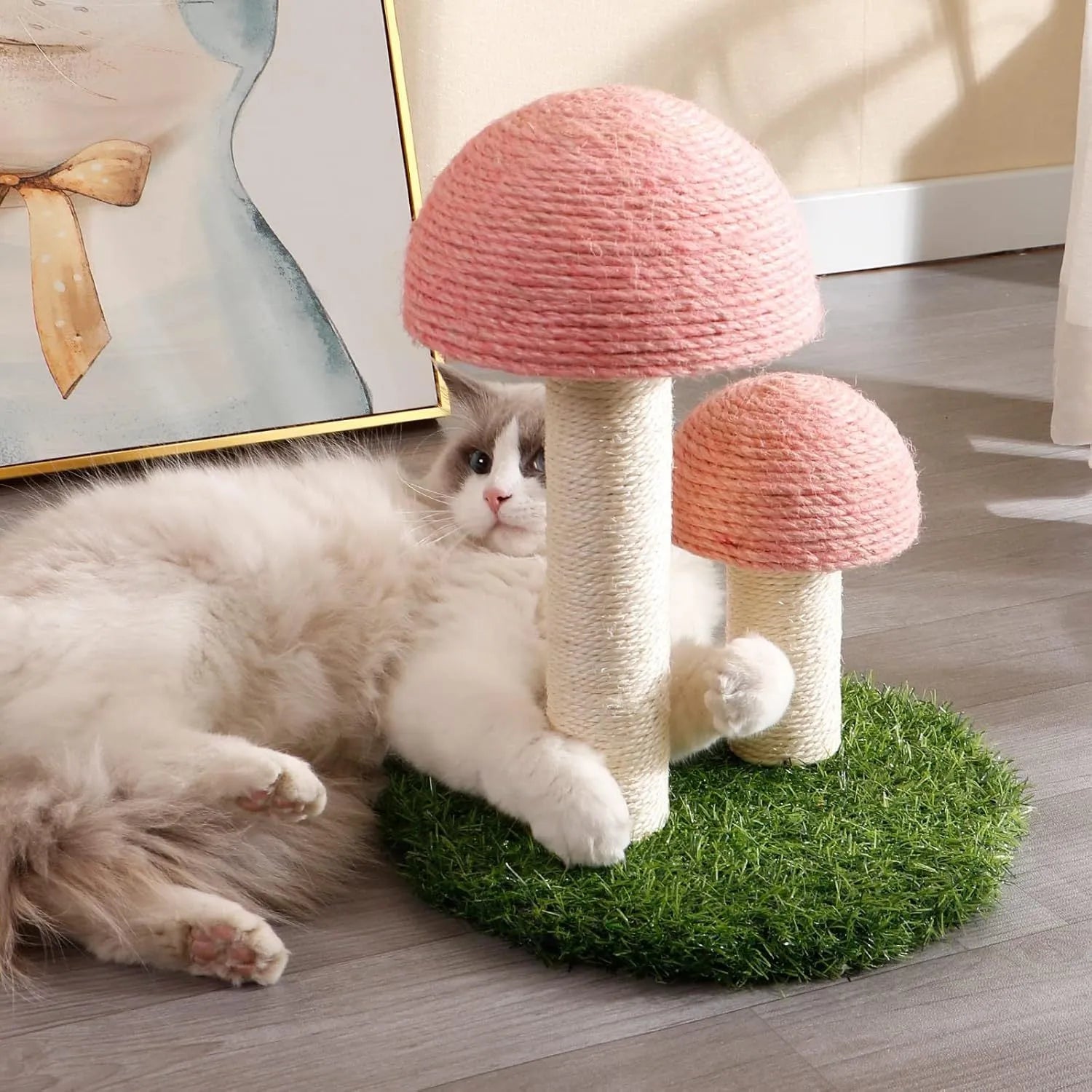 Pink mushroom-shaped cat scratching post with natural sisal caps and pole for small cats