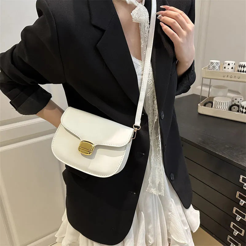 Women's PU leather handbag showing internal zipper pocket and phone compartment in available colours