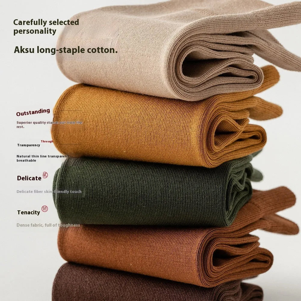 Mid-calf business men's socks in pure combed cotton with sweat absorption and deodorant properties, solid colour design