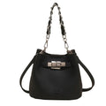 Soft black PU leather retro bucket shoulder bag showing interior phone and zipped pockets.