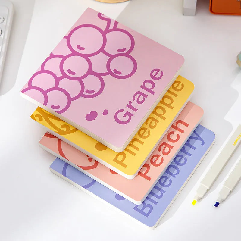 Square fruit-embossed notebook in blueberry design, showing 14.5cm size and 80g paper pages.