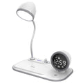 White three-in-one desk lamp with digital clock display and wireless charging pad for smartphones