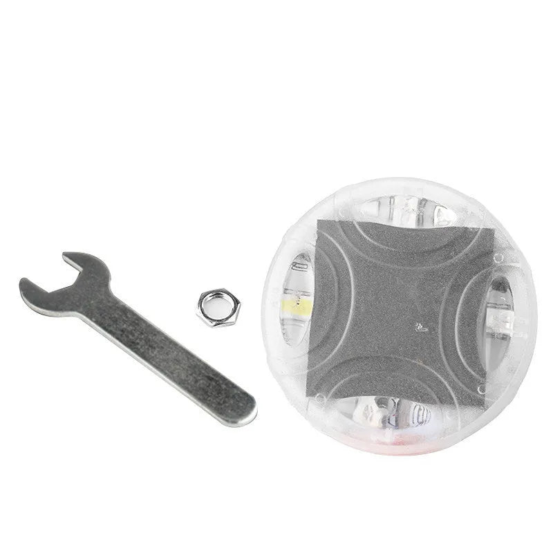 Solar-powered LED valve stem lights with colourful illumination on vehicle wheel, showing 15 flash patterns