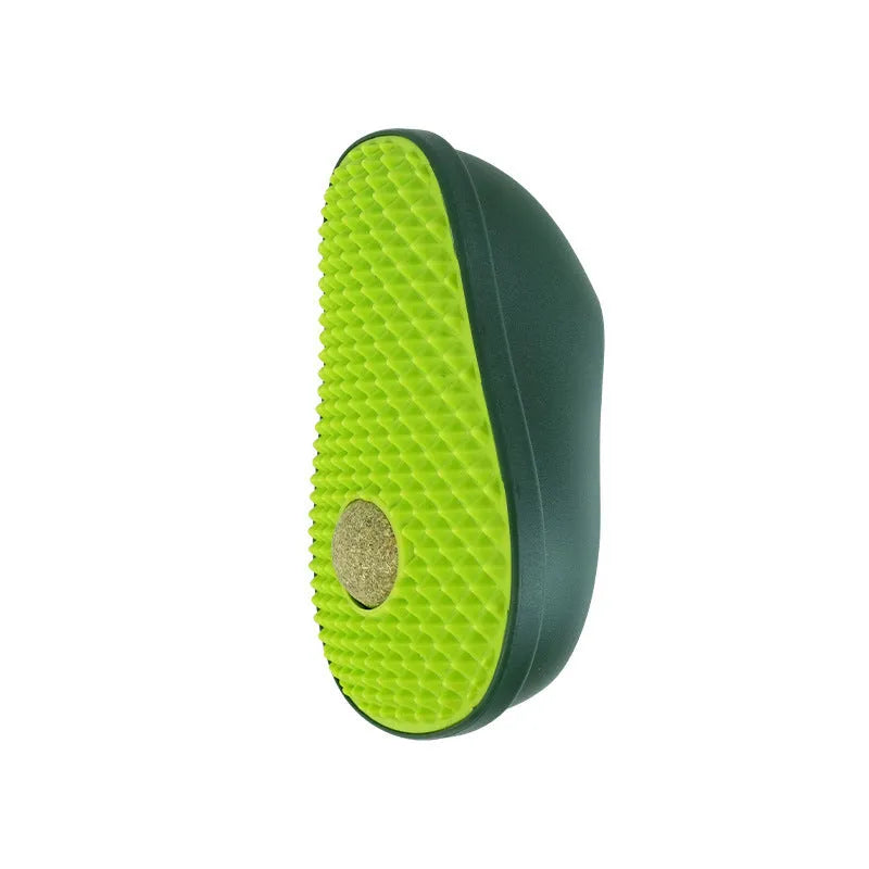 Green avocado-shaped cat scratching toy with textured posts on a white background