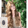 Medium size long curly wig in linen colour made from high temperature synthetic fibre.