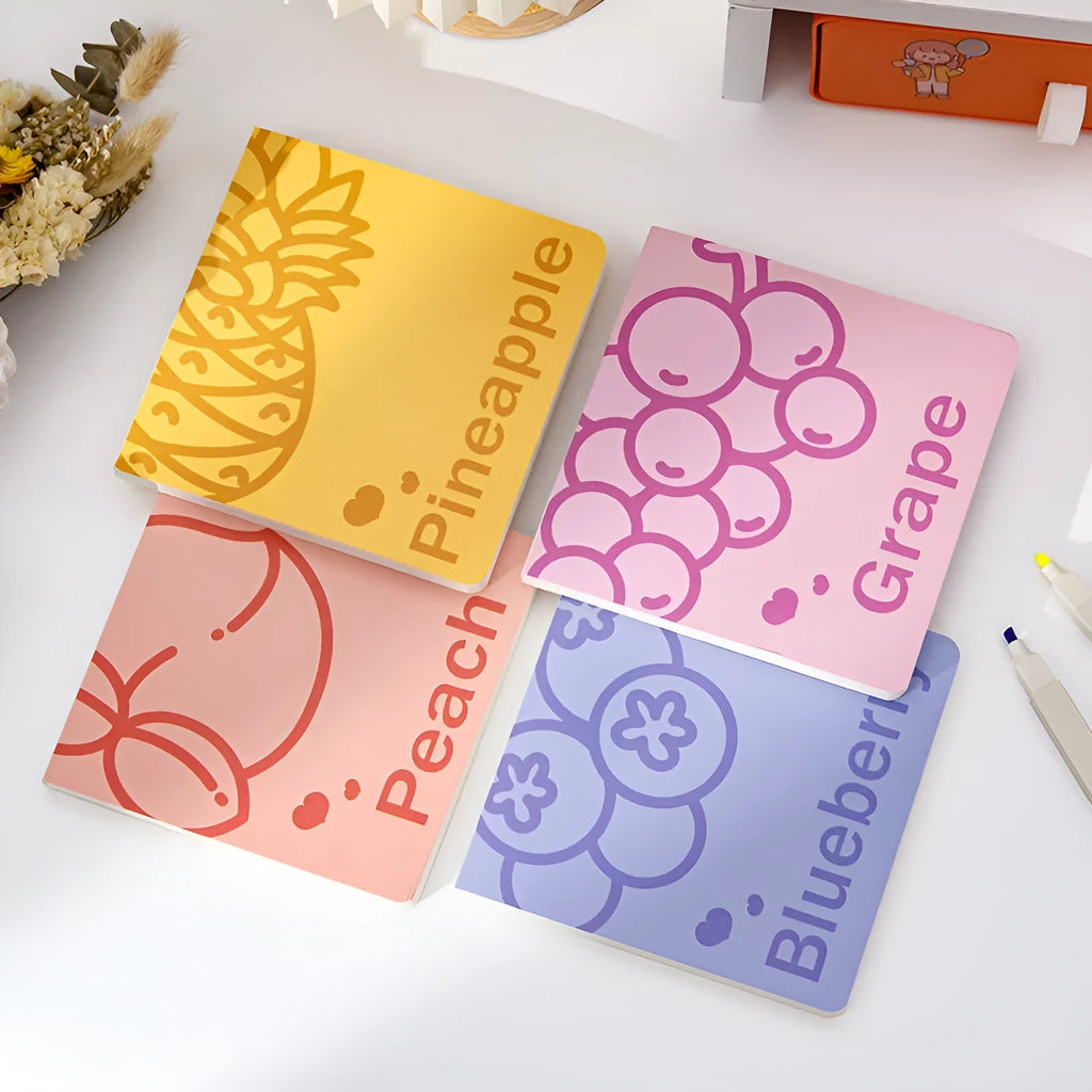 Square fruit-embossed notebook in blueberry design, showing 14.5cm size and 80g paper pages.