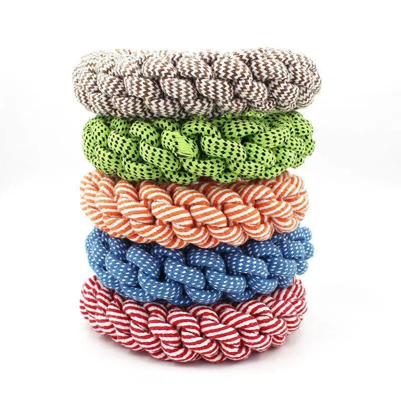 Cotton braided ring dog chew toy showing textured knots and 18cm diameter