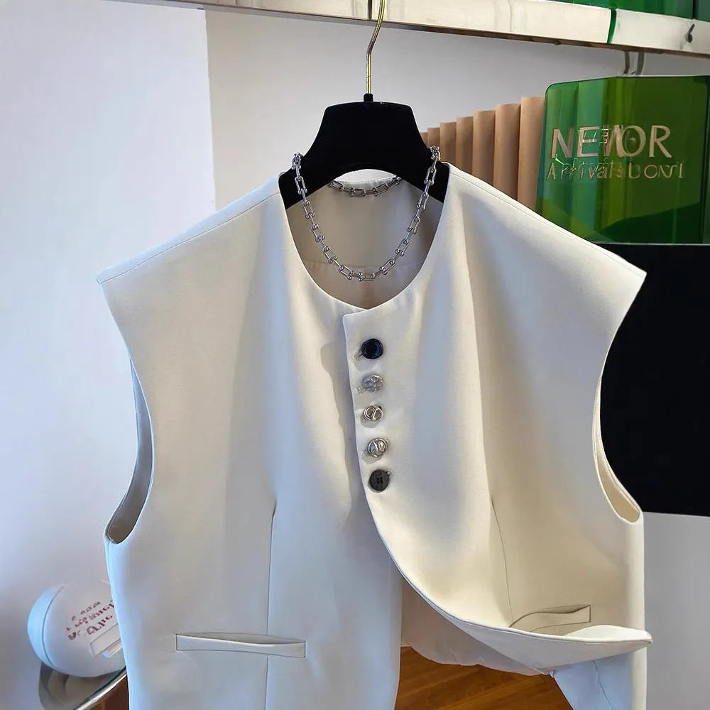 Beige loose-fitting waistcoat dress with side pockets, 40cm length, shown on mannequin