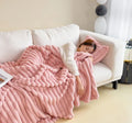 Solid colour double-sided thickening bubble faux rabbit fur velvet blanket draped over a sofa.
