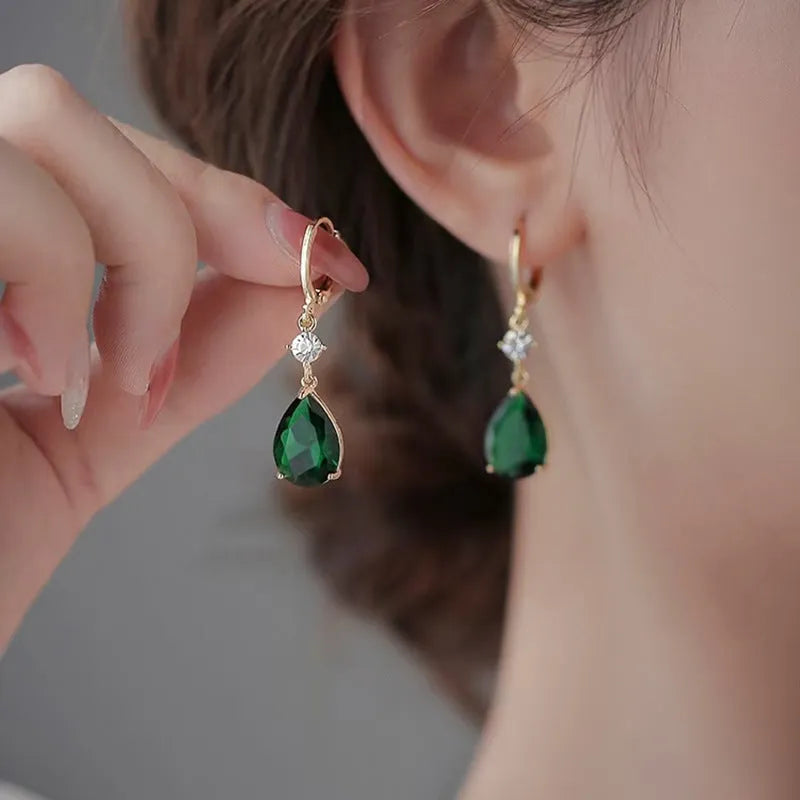 Geometric teardrop earrings in green colour with alloy construction, measuring 3 cm in length