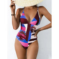 Blue plus size backless one-piece swimsuit for women on a mannequin