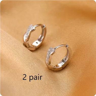 Geometric hemp rope earrings with interwoven design on copper frame, gold plating option shown