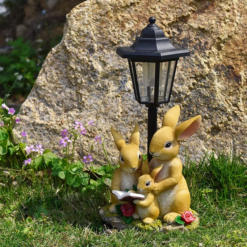 Hexagonal solar garden lamp with resin animal figure, 30cm tall with 24 LED lights for outdoor illumination