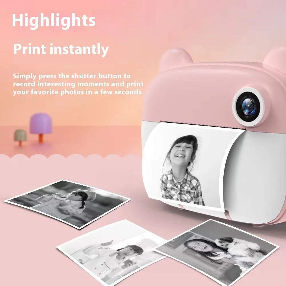 Children's SLR-style toy camera in pink with double lens, games and photo sticker functions