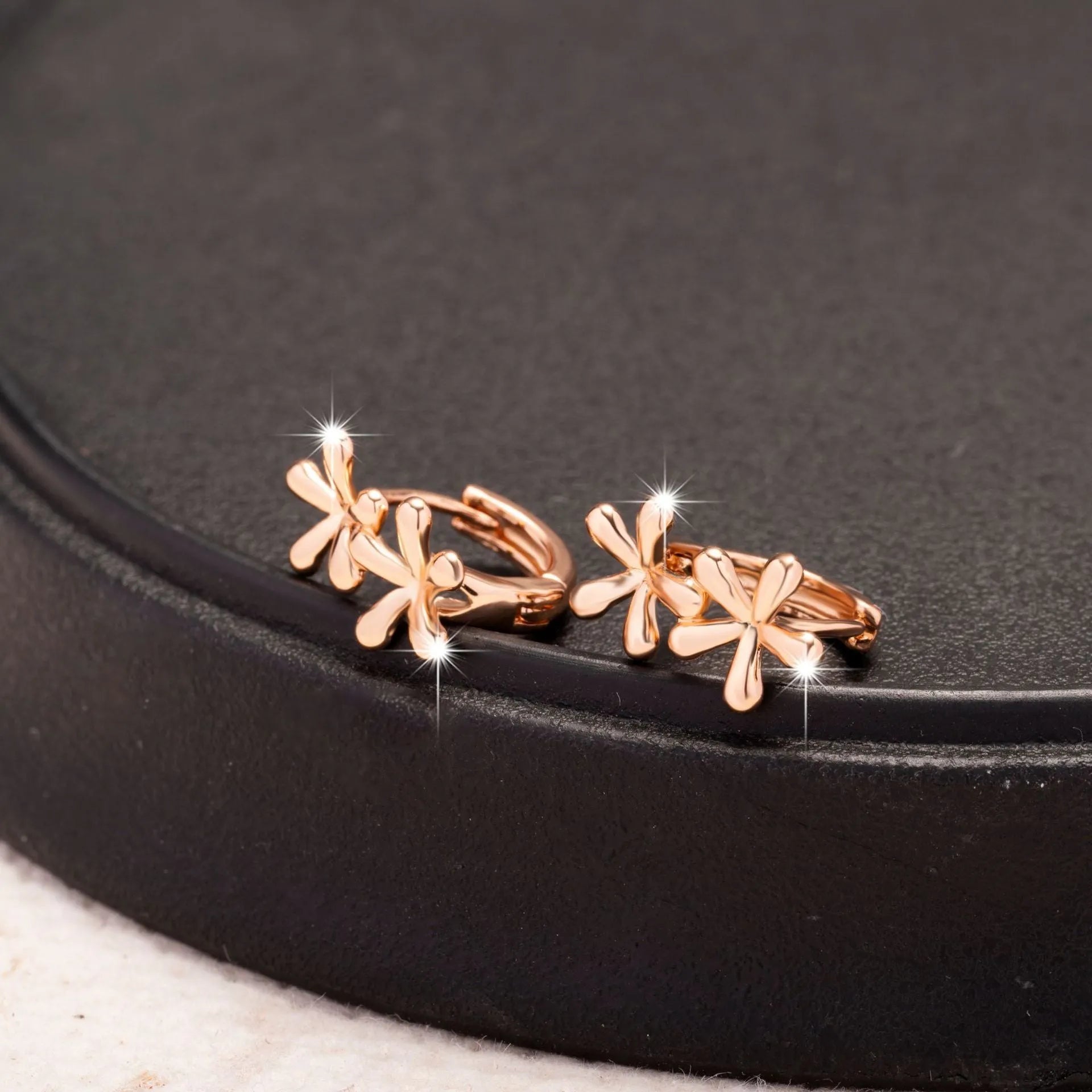 Rose gold electroplated circular waterdrop flower earrings with fresh sweet styling