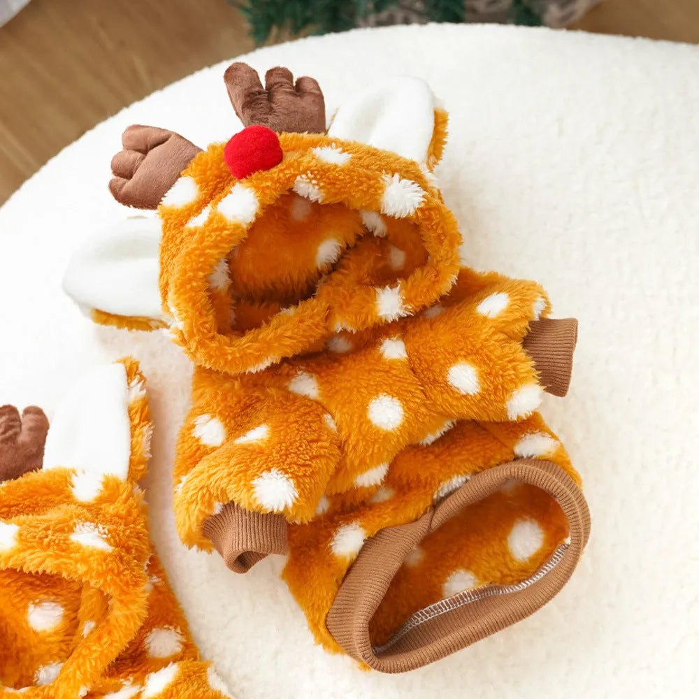 Small dog wearing elk antler Christmas costume with fleece lining and festive design