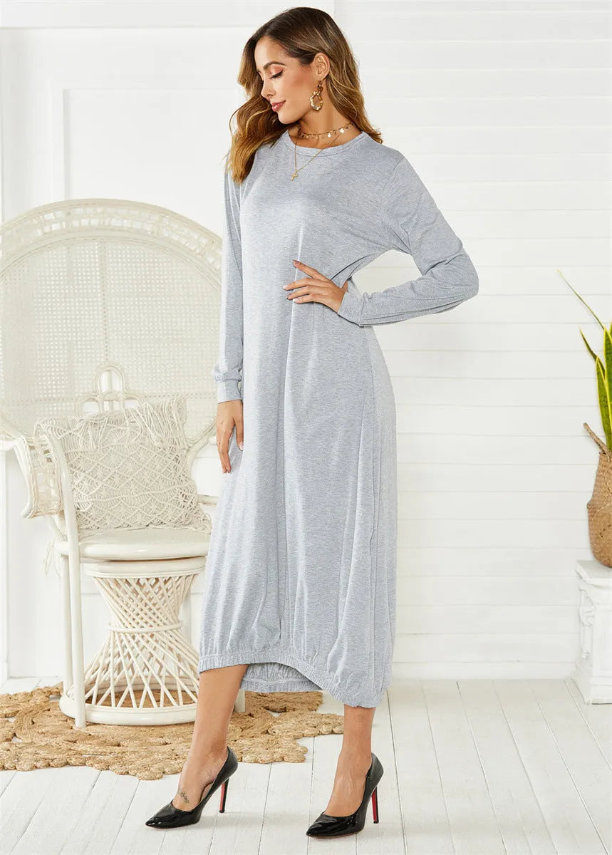 Black lace-up crew neck lantern dress with adjustable front lacing and loose fit, made from knitted polyester.