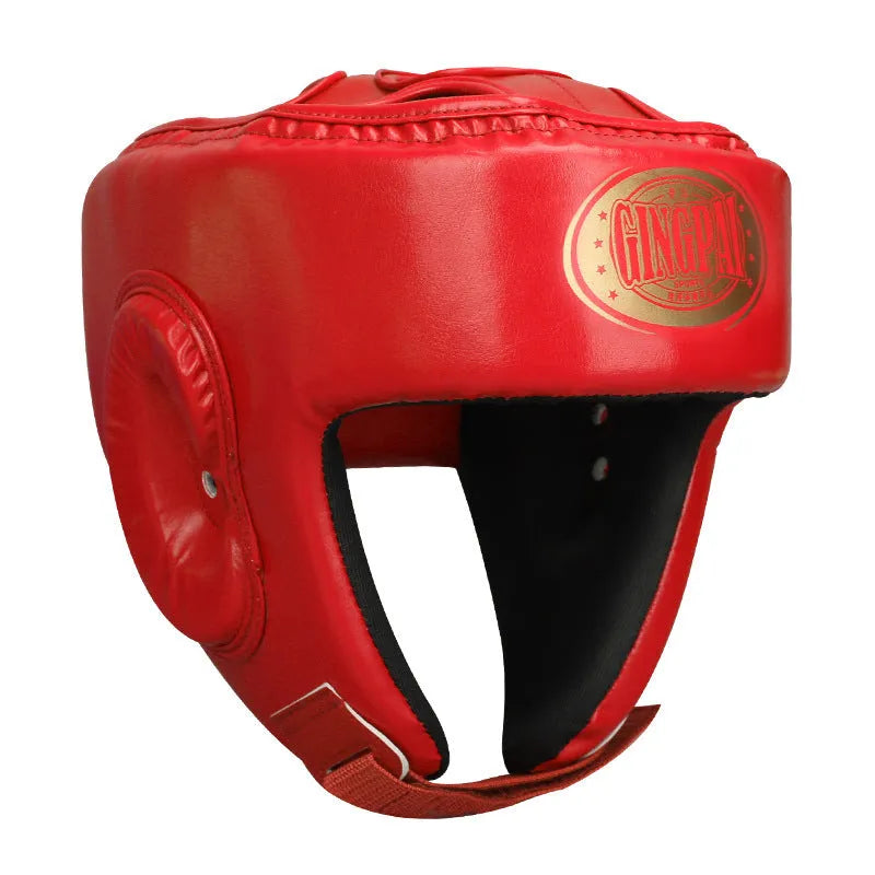 Red fully enclosed boxing helmet with jaw protection showing vertical ventilation design