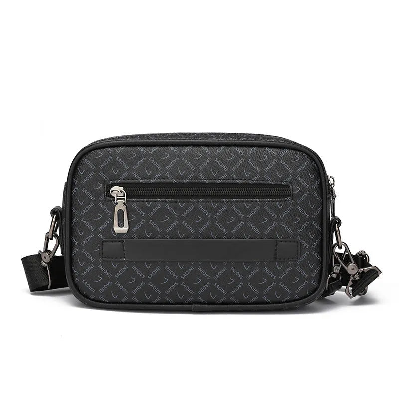 Men's black casual shoulder messenger bag with geometric pattern and handheld strap.
