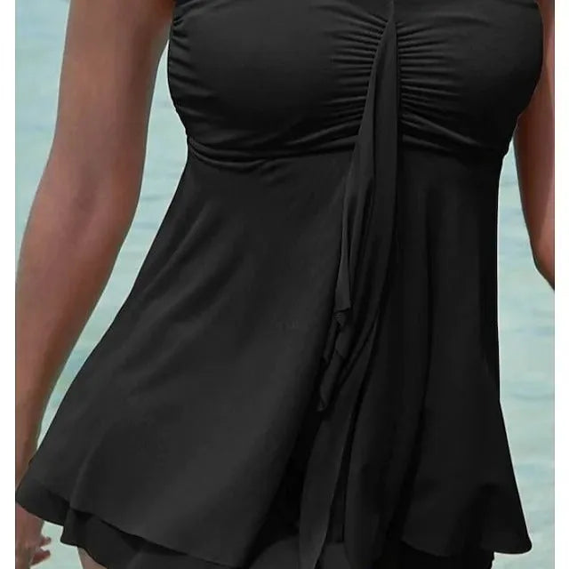 Women's strapless one-piece swimsuit in a solid colour, shown in available shades.