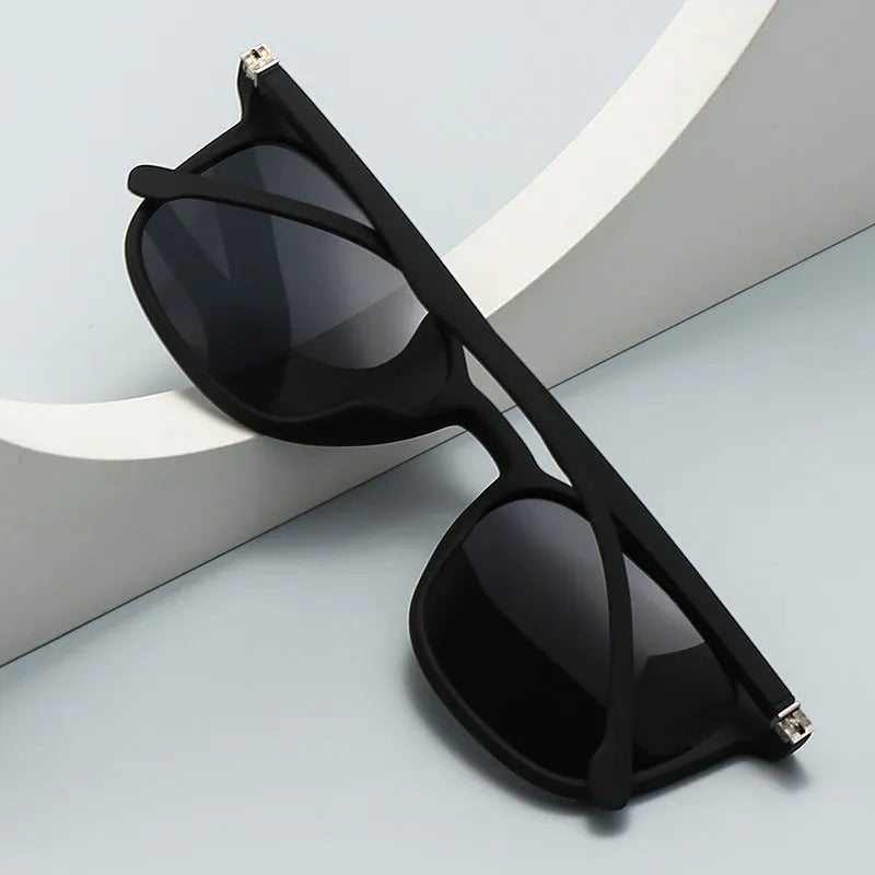 Men's polarised sunglasses with a PC frame and UV400 lenses in a choice of colours including black and blue.
