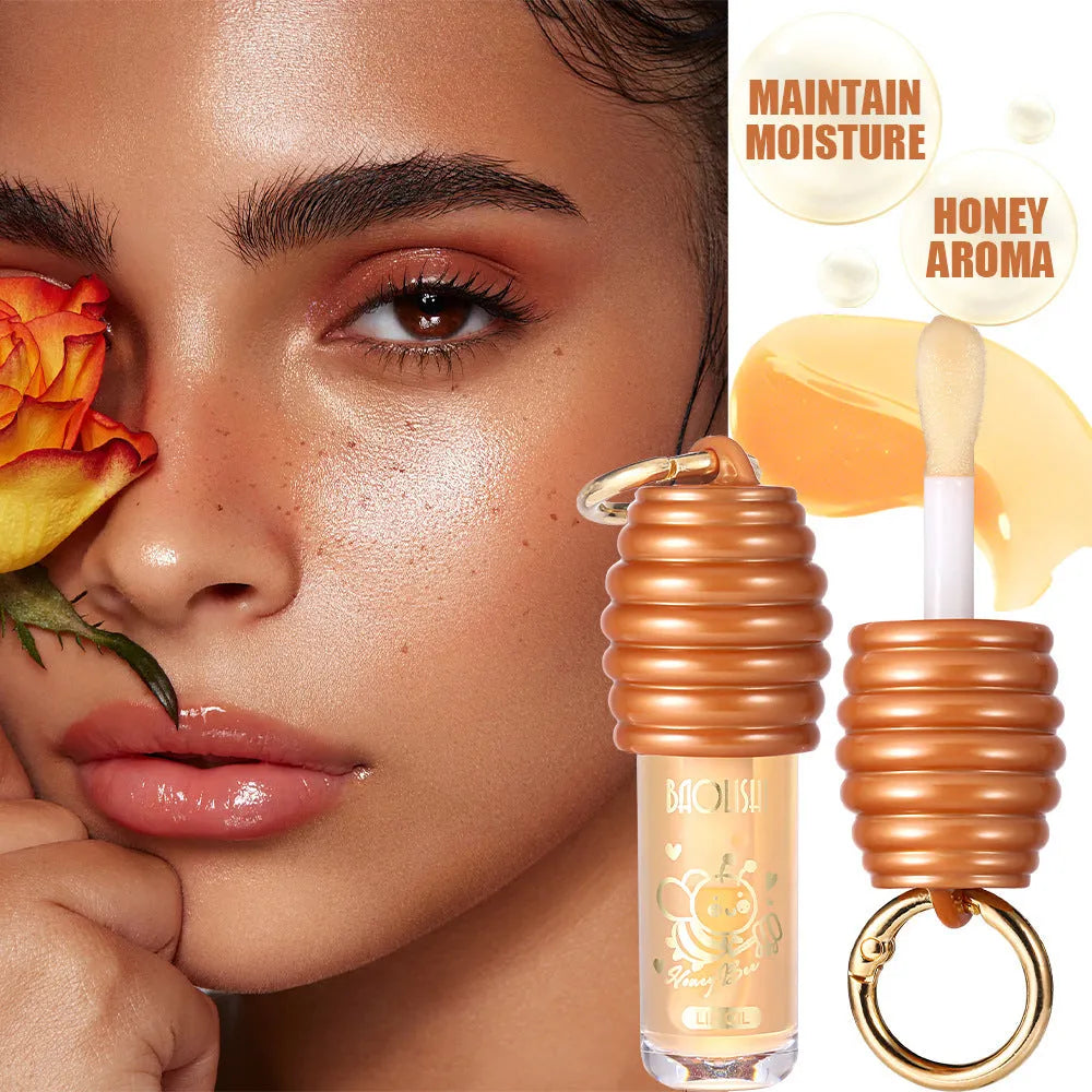 Portable honey lip gloss attached to keychain with moisturising properties