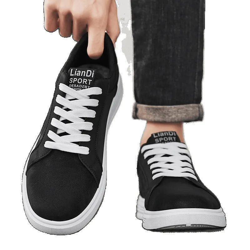 Men's black snake pattern PU leather casual sneakers with round toe and rubber sole on a white background.