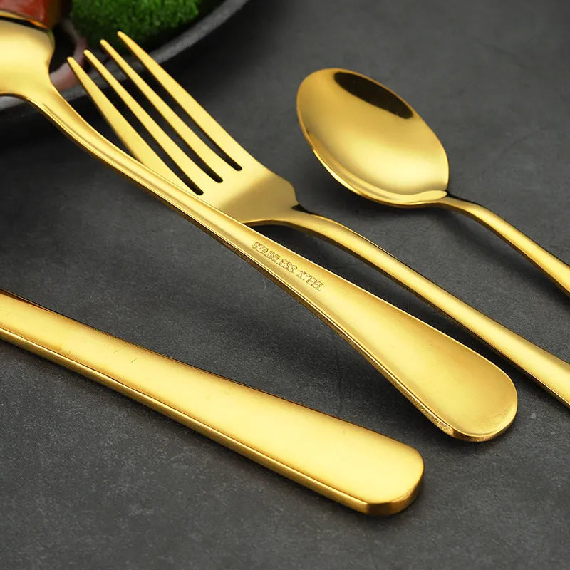 24-piece stainless steel cutlery set showing knives, forks, tablespoons and teaspoons in multiple finish colours