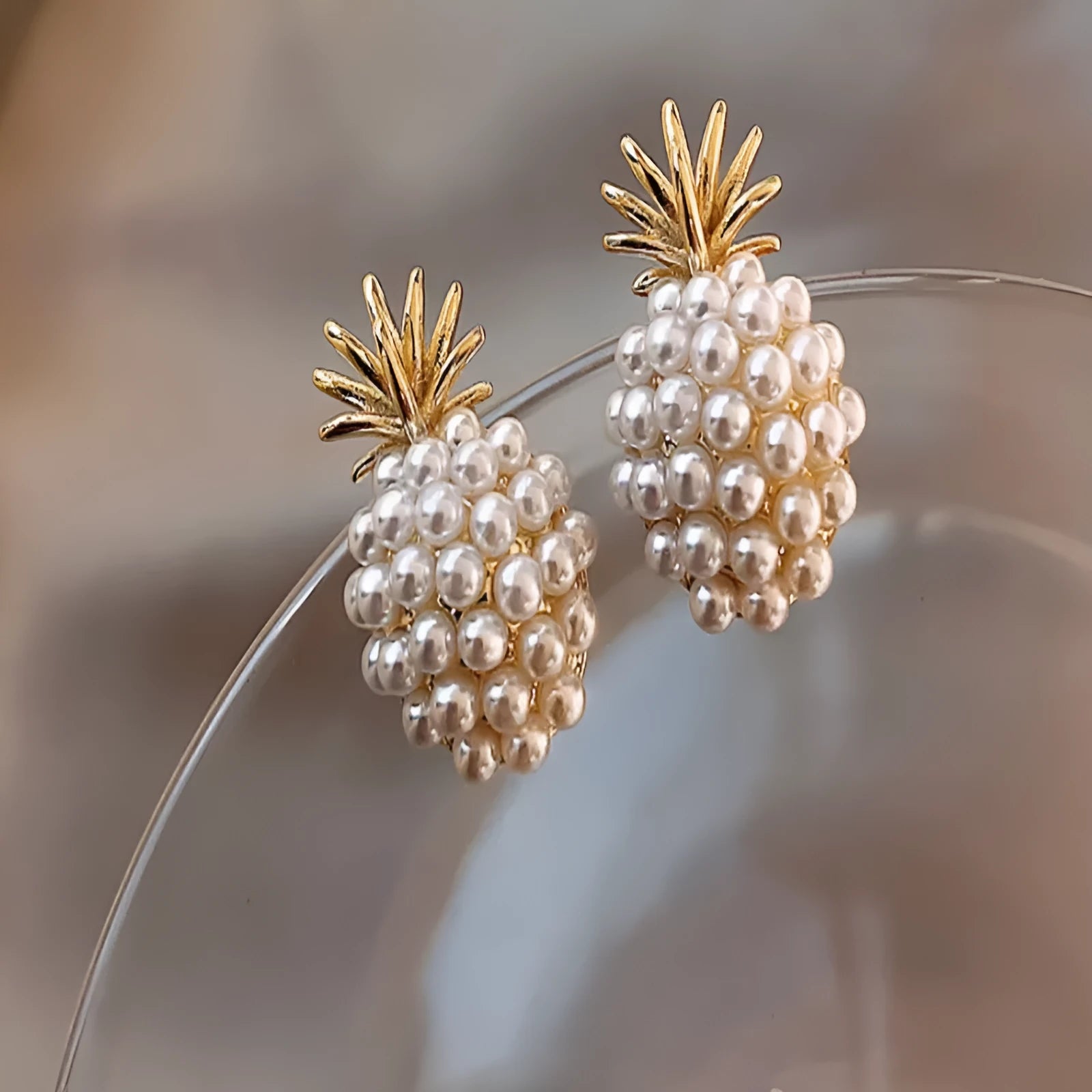 Korean style pineapple starfish pearl earrings in alloy with electroplated finish and stone inlay